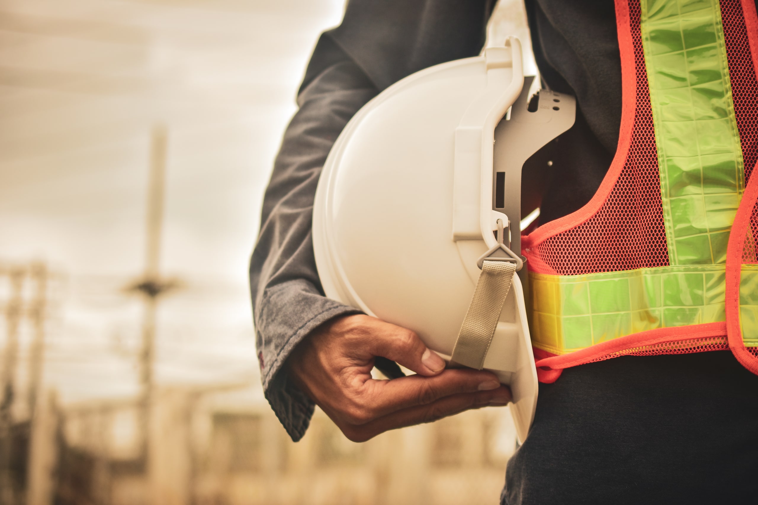 Close,Up,Hand,Holding,White,Helmet,Hard,Hat,Engineering,Concept